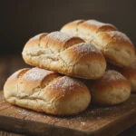 Homemade Hot Dog Buns 7 Soft homemade hot dog buns with a golden-brown crust and fluffy interior.