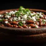 Mexican pinto beans seasoned with traditional spices and simmered until tender.
