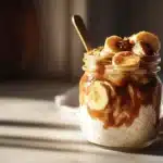 Banana and Biscoff Overnight Oats 7 Banana and Biscoff overnight oats layered with sliced bananas and creamy Biscoff spread in a jar.
