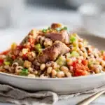 Black-Eyed Peas with Smoked Turkey Wings 7 Black-eyed peas simmered with smoked turkey wings, onions, and spices in a hearty bowl