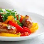 Easy Crockpot Sausage and Peppers 7 Crockpot sausage and peppers with sliced sausage, bell peppers, and onions in rich sauce