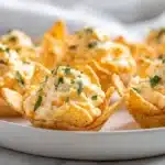 Iowa party bites made with seasoned meat and cheese baked until golden on a platter