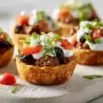 Taco ranch bites baked until golden with seasoned meat, cheese, and ranch flavor on a platter