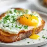 Air Fryer Egg Toast 7 Air fryer egg toast with crispy bread and a baked egg in the center