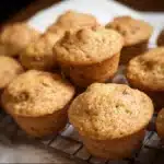 Baby applesauce muffins soft and mini-sized arranged on a plate