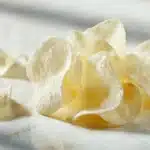 Crispy rice paper chips puffed and golden, served in a bowl