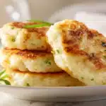 Crispy rice patties fried until golden and served on a plate