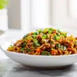 Southwestern rice and beans with seasoned rice, black beans, corn, and peppers in a bowl