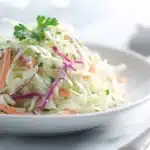 Vibrant Coleslaw 6 Creamy coleslaw made with shredded cabbage and carrots in a tangy dressing