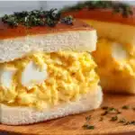 Easy Japanese Egg Sandwich 6 Japanese egg sandwich with creamy egg salad filling between soft, fluffy white bread, crusts removed, cut in halves.