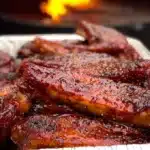 Smoked Party Ribs 6 Smoked party ribs glazed with barbecue sauce and cooked until tender and caramelized